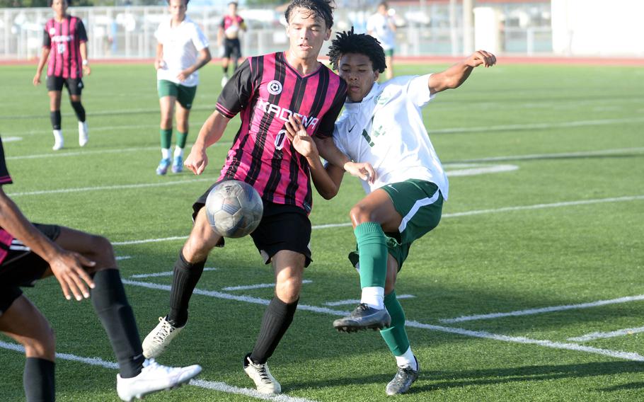 Kadena's Allen Madlener and Kubasaki's Jyunia Darsan battle for the ball during Wednesday's DODEA-Okinawa boys soccer match. The Panthers won 8-0.