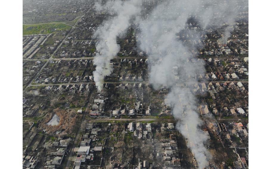 Smoke billows after Russian attacks in the outskirts of Bakhmut, Ukraine, on Tuesday, Dec. 27, 2022.