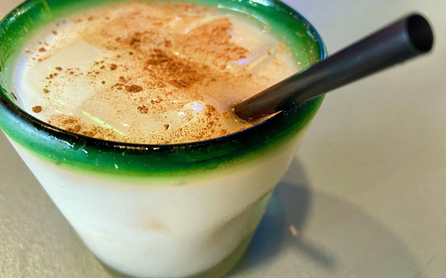 A horchata from Taco Maria near Camp Foster, Okinawa. This sweet, plant-based beverage is made from nuts and grain and has a white, creamy appearance. It’s seasoned with cinnamon powder. 