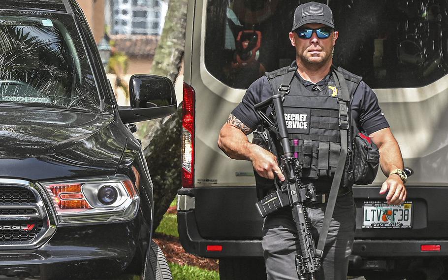 A member of the Secret Service is seen in front of the home of former President Donald Trump at Mar-A-Lago in Palm Beach, Florida, on Aug. 9, 2022. 