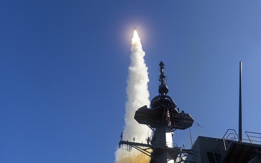 The Japanese destroyer JS Haguro launches a missile during testing earlier this month off Hawaii.