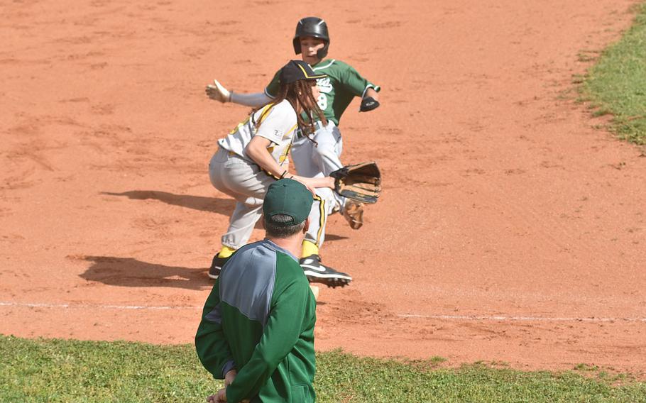 Matthew Butler slides into third.