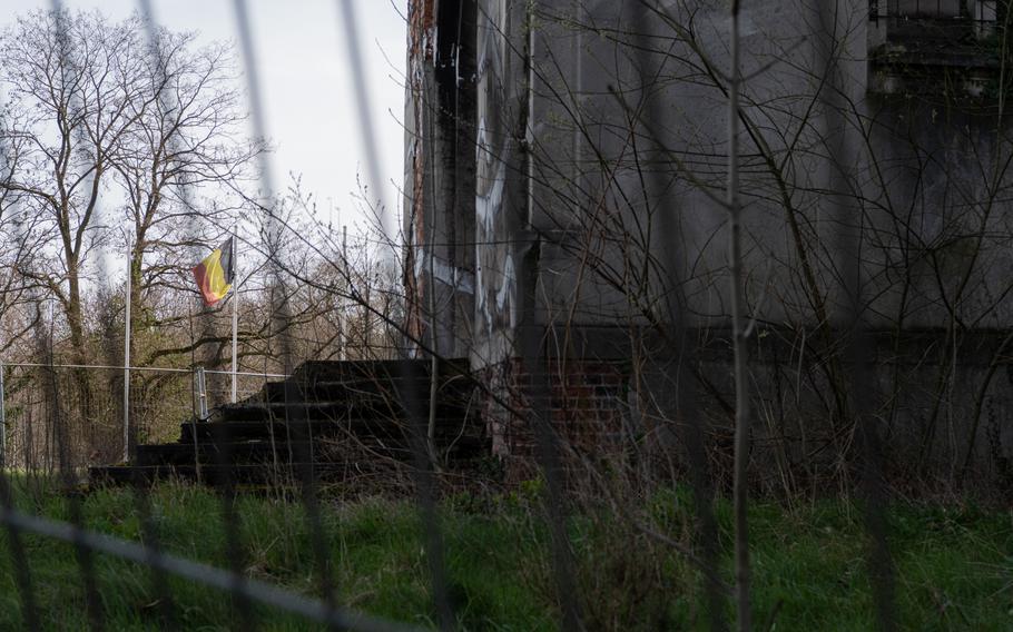 A fence surrounds the Church of the Sacred Heart in Liege, Belgium, March 28, 2023. The church was inaugurated in the 1930s to commemorate World War I allied troops, but it has sat empty for the past two decades and now poses a safety risk. 