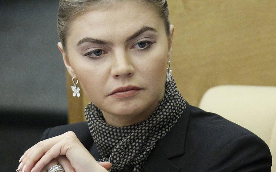 Alina Kabayeva, a former champion rhythmic gymnast and now a Duma member for the pro-Kremlin United Russia party, attends the first plenary session of the newly-elected State Duma, the lower parliament chamber, Moscow, Russia.
