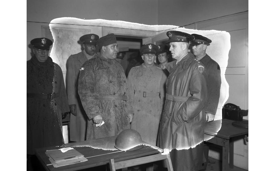 Lt. Gen. Clarence R. Huebner (second from right) inspects one of the classrooms of the Kitzingen Basic Training Center for Negro troops, as the center’s commandant, Brig. Gen. Lewis C. Beebe (right of Huebner) listens.