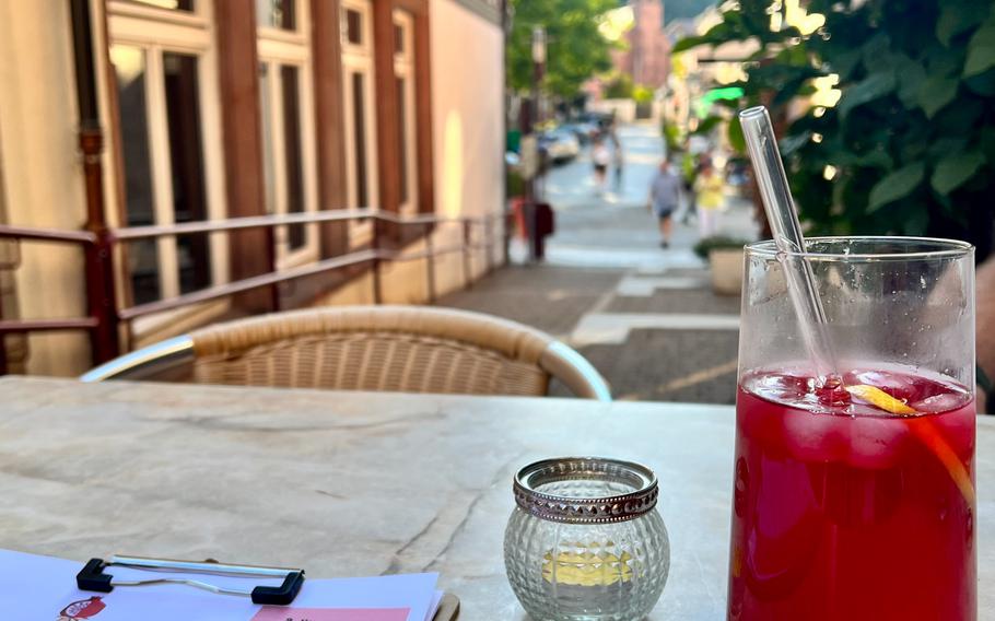 A house-made hibiscus lemonade and the view to the town square in Landstuhl, Germany, make for a wonderful summer day stop Aug. 7, 2022. The restaurant is centrally located in Landstuhl and close to shopping and Nanstein Castle on the hill above.
