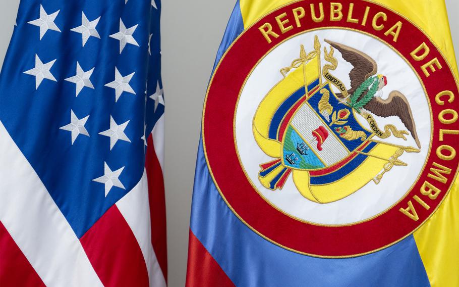 A close-up of the U.S. and Colombian flags.