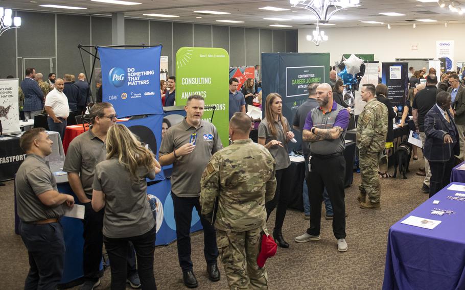 Company recruiters and job hunters talk during the Hiring Our Heroes job fair, April 27, 2023, at the Hope Hotel & Richard C. Holbrooke Conference Center, Wright-Patterson Air Force Base, Ohio. The U.S. Chamber of Commerce Foundation’s annual hiring event helps transitioning service members, veterans and military spouses find employment. 