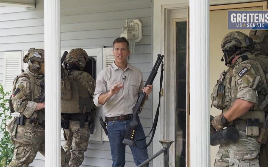 Former Missouri Gov. Eric Greitens put out a video Monday that showed him and a group of men in tactical gear with guns hunting Republicans who they do not deem adequately conservative, ramping up the war-like messaging of his campaign for U.S. Senate.