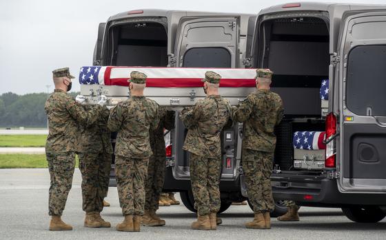 A U.S. Marine Corps carry team transfers the remains of Marine Corps Lance Cpl. Kareem M. Nikoui of Norco, California, Aug. 29, 2021 at Dover Air Force Base, Delaware. Nikoui was assigned to 2nd Battalion, 1st Marine Regiment, 1st Marine Division, I Marine Expeditionary Force, Camp Pendleton, California. (U.S. Air Force photo by Jason Minto)