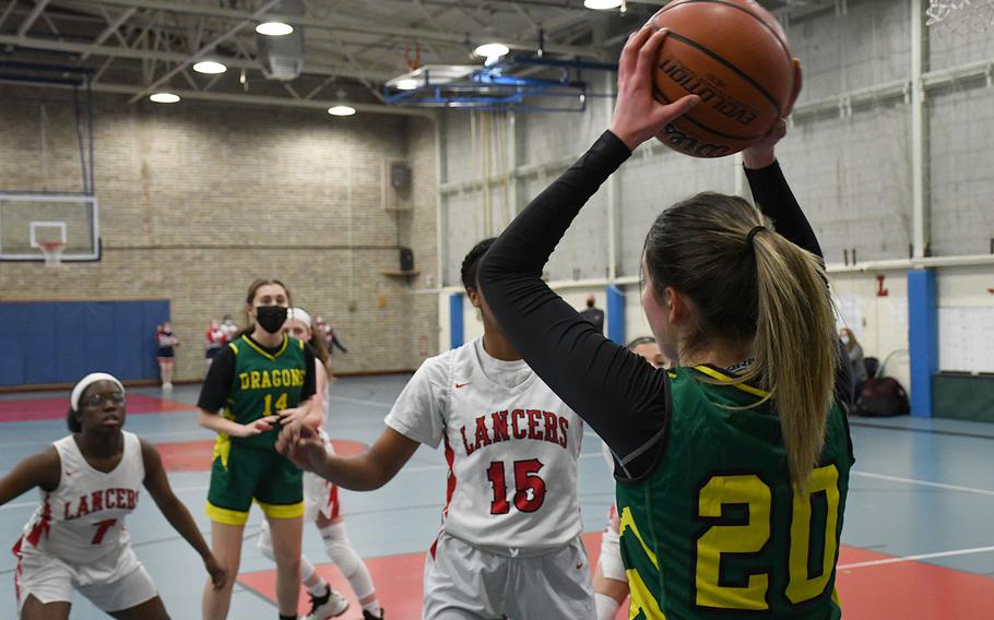 Lakenheath's Sadie Liddell looks for an open teammate in the Lancers' game against Alconbury on Tuesday, Jan. 18, 2022.