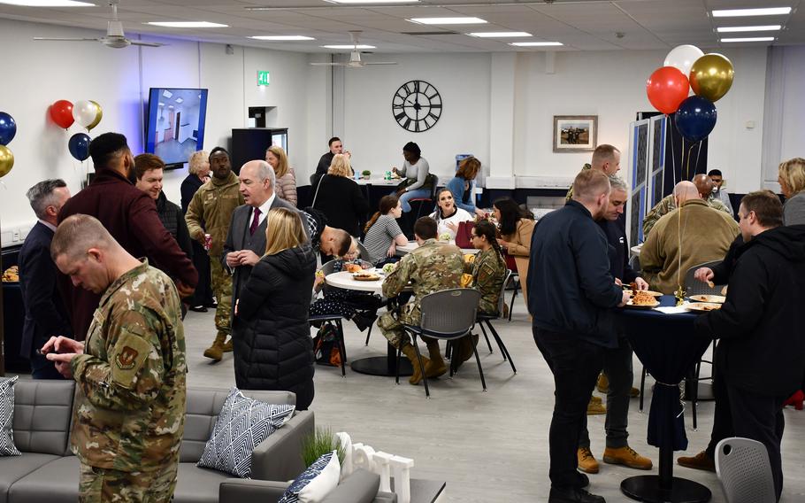 Visitors to the grand opening of the USO center at RAF Lakenheath, England, enjoy a free catered lunch Nov. 4, 2021. The organization also opened its first location at an Army base in Poland a couple of days earlier.