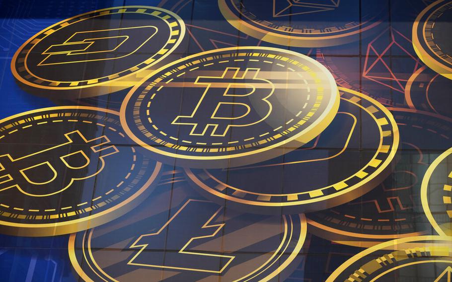 An advertisement of Bitcoin, one of the cryptocurrencies, is displayed on a building in Hong Kong, on Nov. 18, 2021.