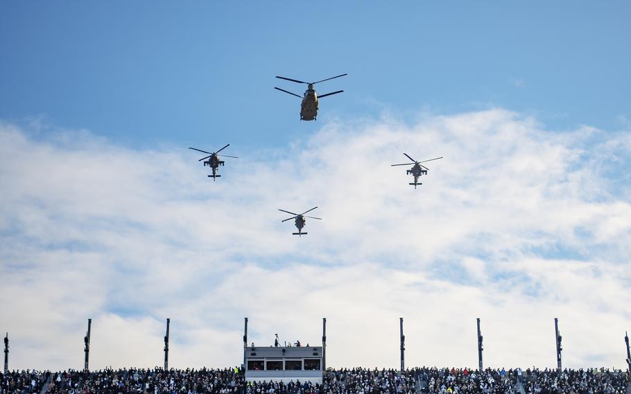 Just before the start of the 123rd Army-Navy football game, four Army helicopters performed a flyover of the Lincoln Financial Field stadium in Philadelphia, where 69,117 people were in attendance on Saturday, Dec. 10, 2022.