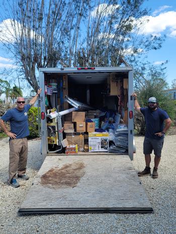 Veteran Ryan Hontz, left, and Matt Ryan recently delivered donated supplies to Hurricane Ian survivors in Englewood, Fla.