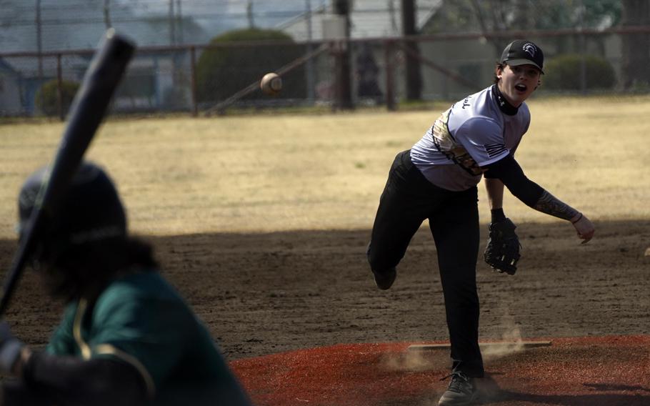Zama's William Schmiedel delivers against Edgren during Saturday's DODEA-Japan baseball game. The Trojans won 7-2.