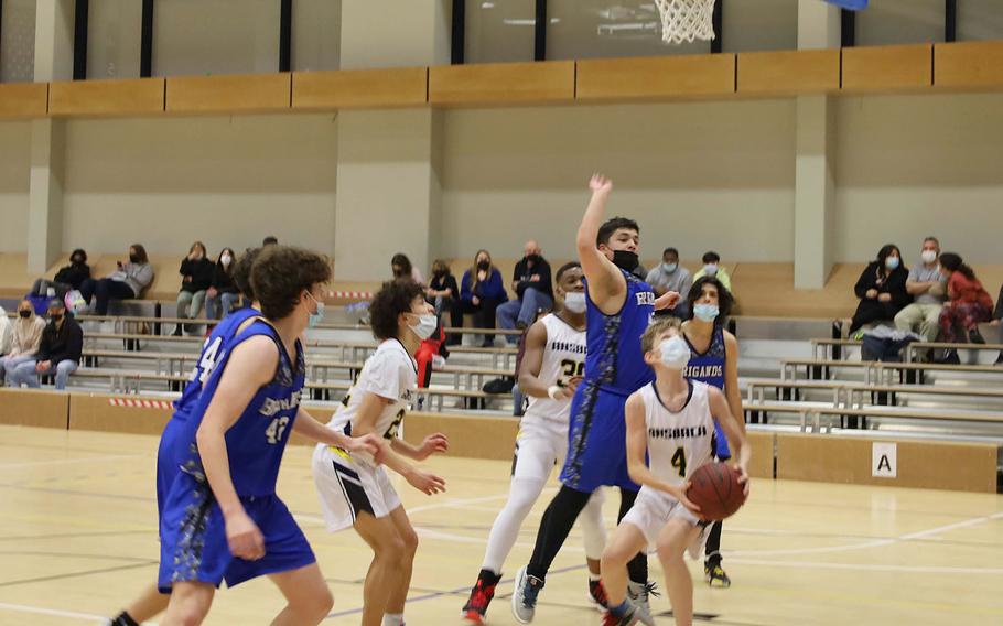 Ansbach's Benjamin Schuck prepares to shoot during a game against Brussels at Ansbach, Germany, on Friday, Feb. 4, 2022.