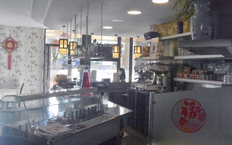 The interior of Grande Muraglia, a Chinese restaurant in Sacile, Italy,  is decorated with Chinese symbols, lamps and wallpaper.

Kent Harris/Stars and Stripes