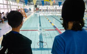 Remington Herrin, left, and Rafael Menzel team up to compete in the SeaPerch Challenge, an aquatic robotics race, at Yokosuka Naval Base, Japan, on April 7, 2024.