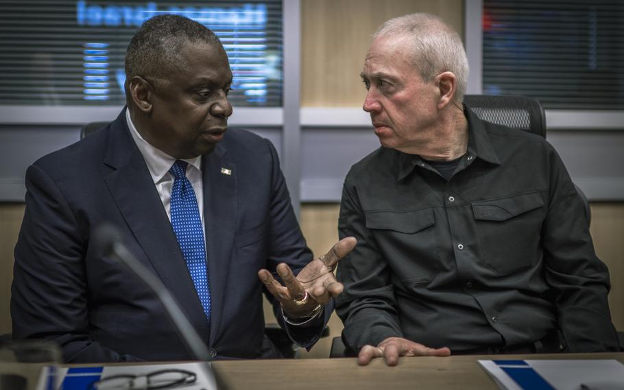 Secretary of Defense Lloyd J. Austin III speaks with Israeli Minister of Defense Yoav Gallant during a meeting in Tel Aviv, Israel, in October 2023.