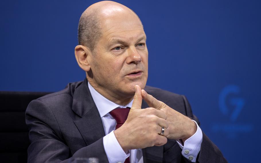 German Chancellor Olaf Scholz attends a briefing on Feb. 16, 2022, in Berlin, Germany. 