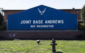 FILE - The sign for Joint Base Andrews is seen on March 26, 2021, at Andrews Air Force Base, Md. Joint Base Andrews, one of the nation’s most sensitive military bases and home to Air Force One, has been locked down after reports of a man carrying an “assault-style” rifle on Thursday, March 30, 2023, authorities said. (AP Photo/Alex Brandon, File)