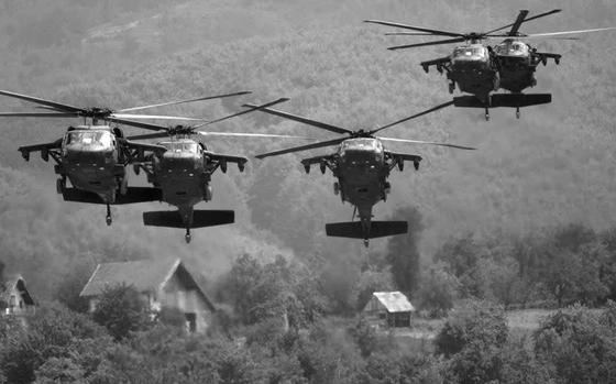 Camp Bedrock, Bosnia and Herzegovina, June 4, 1997: U.S. Army UH-60 Black Hawks with Task Force 2nd Battalion, 2nd Infantry and 2nd Russian Brigade soldiers on board, rapidly descend in an open area near Camp Bedrock to set up a security checkpoint during a combined training mission to enhance U.S./Russian interoperability.

Looking for Stars and Stripes’ historic coverage? Subscribe to Stars and Stripes’ historic newspaper archive! We have digitized our 1948-1999 European and Pacific editions, as well as several of our WWII editions and made them available online through https://starsandstripes.newspaperarchive.com/

META TAGS: U.S. Russian relations; Yugoslav war; SFOR