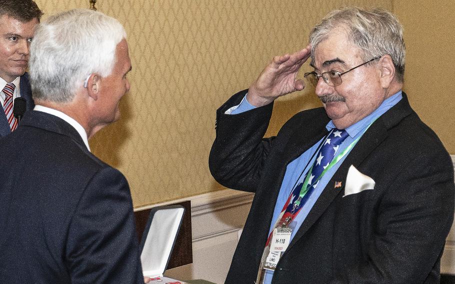 Vietnam veteran Lino Petrucco, who served with B Company, 720th Military Police Battalion, 18th Military Police Brigade, salutes as he receives his Bronze Star medal from Rep. Robert Latta, R-Ohio, Monday, July 24, 2023, on Capitol Hill.