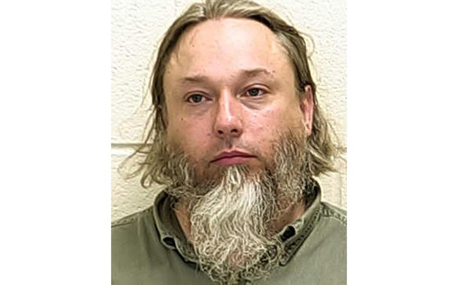 This undated file photo provided by The Ford County Sheriff's Office in Paxton, Ill., shows Michael Hari, a militia leader convicted of masterminding the bombing of a Minnesota mosque. Hari is now known by her transgender identity, Emily Claire Hari.