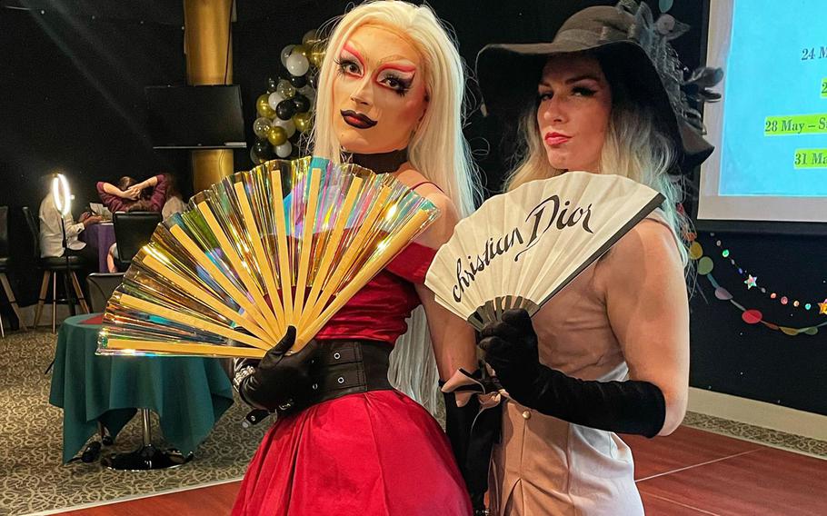 Tokyo-based drag queen Angel, left, and Air Force spouse Crystal Branco attend the drag queen brunch at the Enlisted Club at Yokota Air Base, Japan, May 7, 2023. 