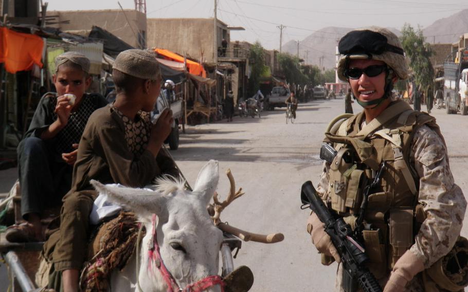 Juliana Mercer, who served in the Marine Corps for 15 years, is shown in Helmand, Afghanistan, in 2010. She works now with a nonprofit advocating for MDMA-assisted therapy.