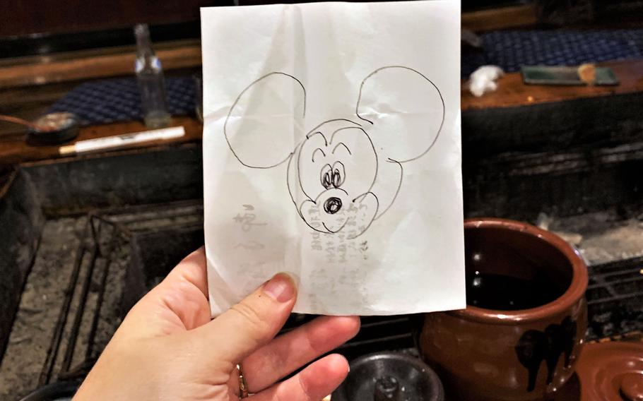 The owner of Sanrokuen came by regularly to check on my family, and to the delight of my children, drew doodles of cartoon characters on slips of paper.