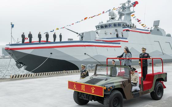 In this photo released by the Taiwan Presidential Office, Taiwan's President Tsai Ing-wen inspects the commissioning of two new navy ships in the northern Taiwan port of Suao on Tuesday, March 26, 2024. Taiwan has commissioned two new navy ships as a safeguard against the rising threat from China, which has been ratcheting up its naval and air force missions around the island that it claims as its own territory to be annexed by force if necessary. The pair of Tuo Chiang class corvettes completes the first order of six of the domestically produced catamarans with stealth capabilities. 