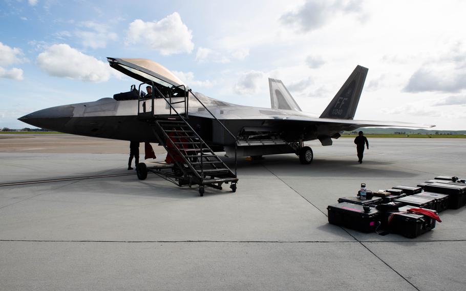 A U.S. Air Force F-22 Raptor assigned to the F-22 Raptor Demonstration Team sits parked on the flight line at Travis Air Force Base, Calif., March 11, 2024.  