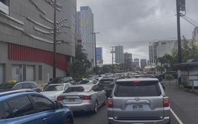 Cars lined up in a traffic jam.