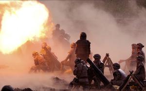 North Korean soldiers conduct a mortar drill at an unspecified location in North Korea, Aug. 11, 2025. 