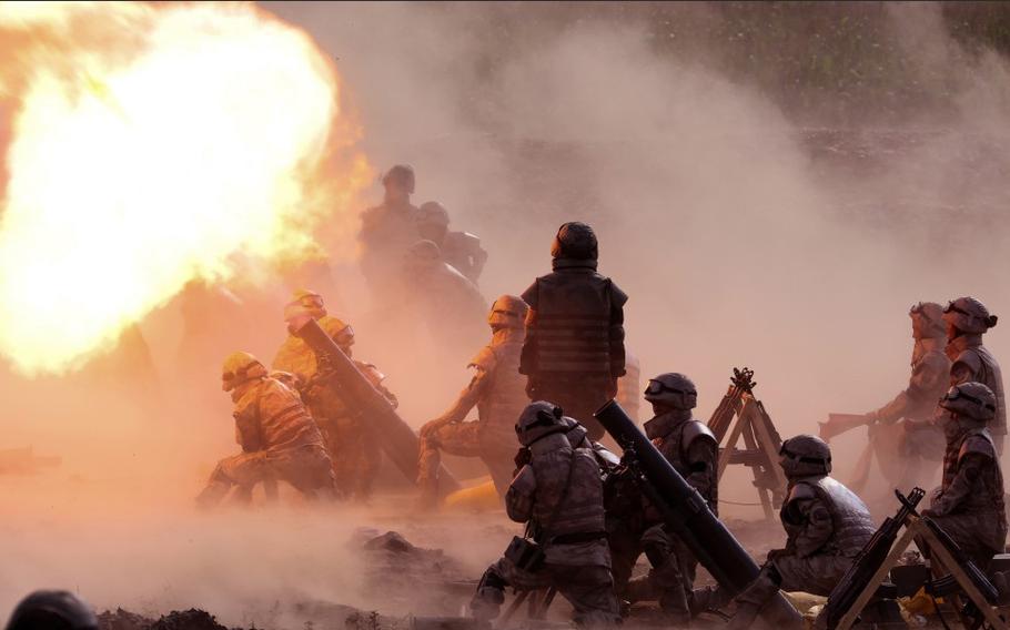 North Korean soldiers conduct a mortar drill.