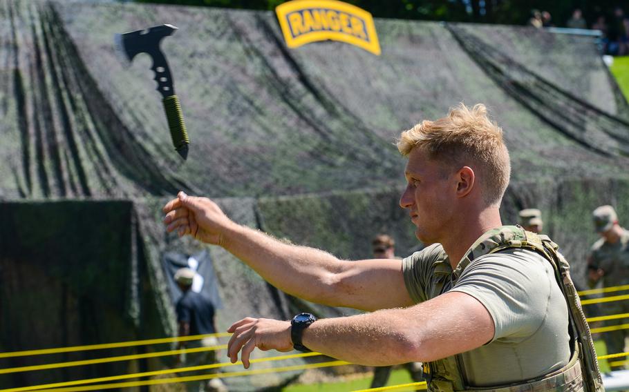 A Best Ranger Competition competitor throws an axe during the second day of the Best Ranger Competition, Saturday, April 15, 2023 at A.J. McClung Memorial Stadium in Columbus, Ga. 