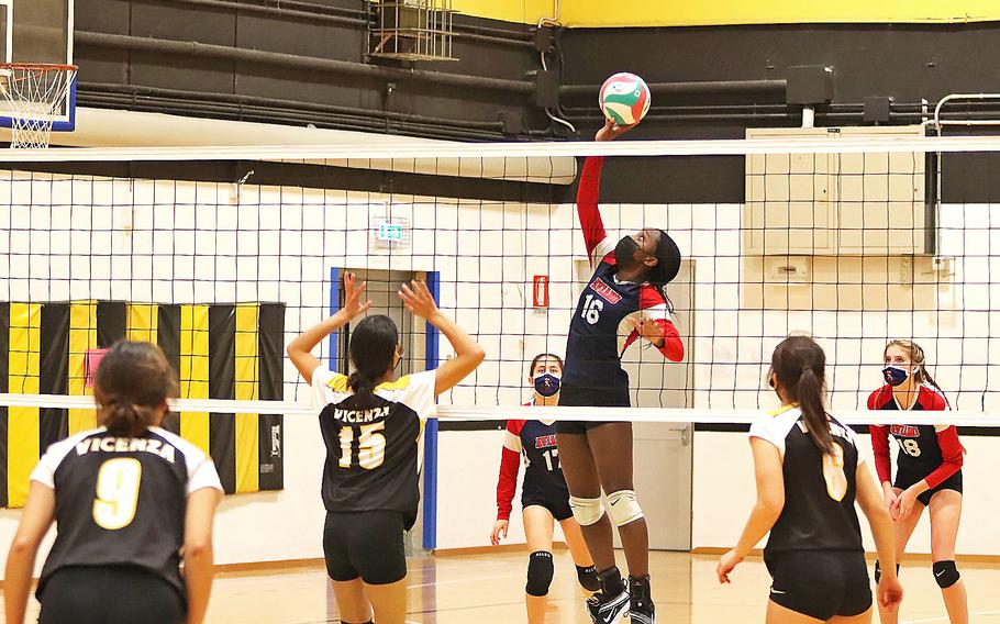 Aviano's Zurnia Dickerson taps the ball over the net Satuday, Oct. 30, 2021, at the DODEA-Europe Division II tournament in Vicenza, Italy.  Vicenza won the championship 25-19, 25-23, 20-25, 26-24.