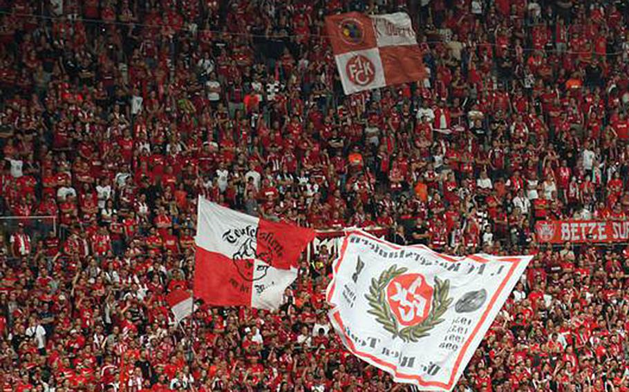  Kaiserslautern fans cheer on their soccer team during a game at Fritz Walter Stadium. The Red Devils qualified for a spot in the German cup final after beating Saarbrücken 2-0.