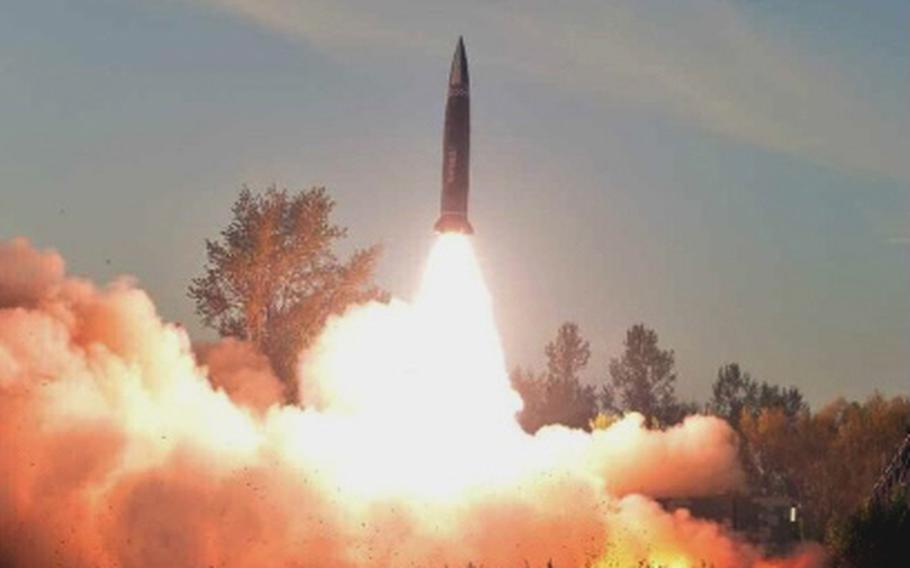 A North Korean missile takes flight in this undated photograph from the Korean Central News Agency.