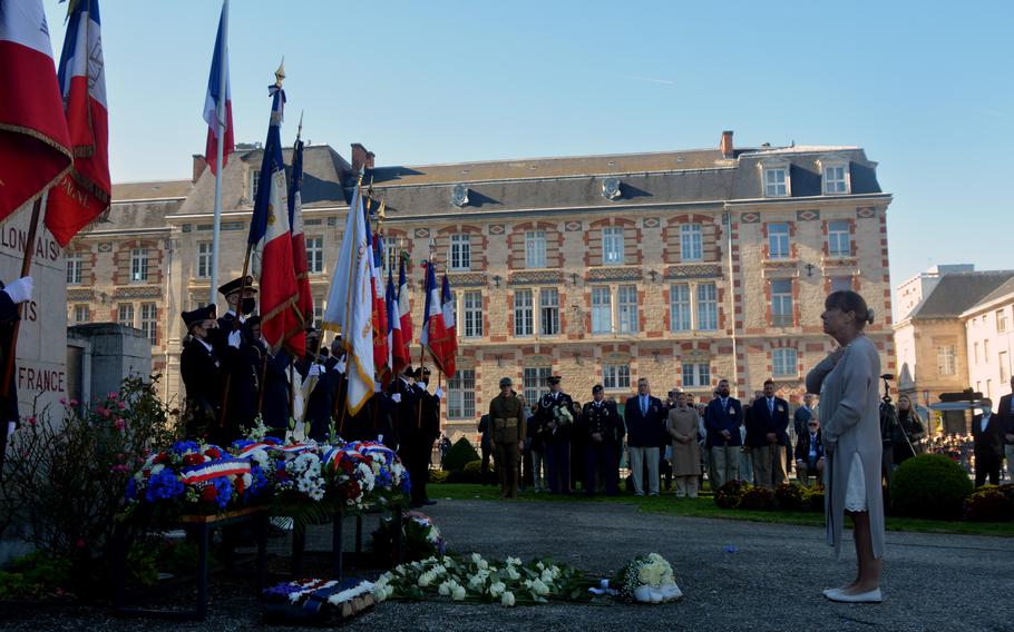 Jo Ann Maitland, national president of American Gold Star Mothers, pays her respects at a monument to World War I service members who died for France at the Cathedral Saint Etienne in Chalons-de-Champagne, France, Oct. 24, 2021. Maitland and a pilgrimage of about 40 others from America attended ceremonies honoring the selection 100 years ago of the U.S. Unknown Soldier.   