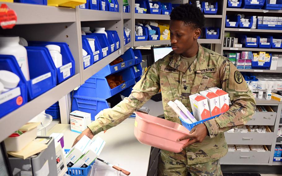 A pharmacy technician at Kimbrough Ambulatory Care Center prepares medication requests at Fort Meade, Md., on Feb. 12, 2024.