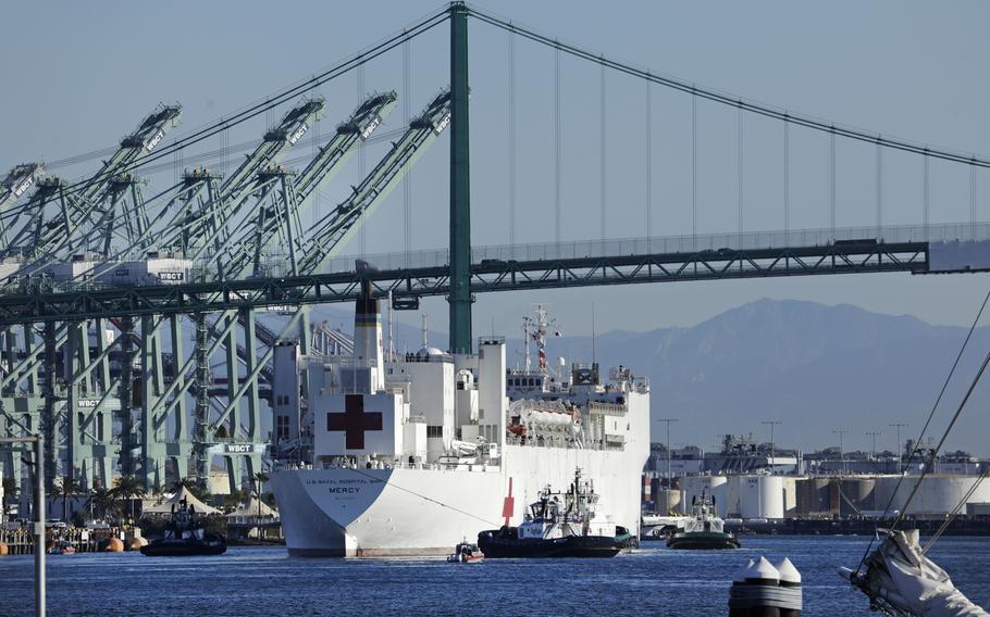 The U.S. Navy hospital ship Mercy arrives at the Port of Los Angeles in March 2020 to serve as a relief valve for hospitals overburdened by the COVID-19 pandemic.