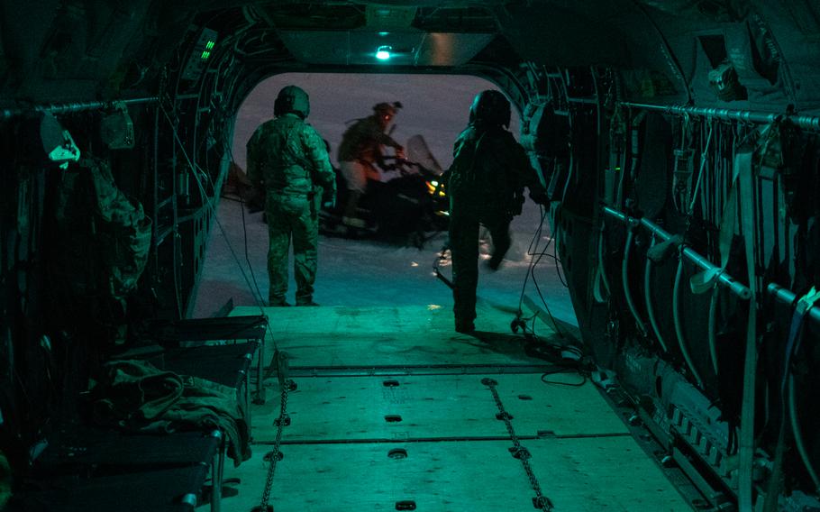 U.S. Army soldiers assigned to Bravo Company, 1st Battalion, 52nd Aviation Regiment, pick up paratroopers assigned to 1st Squadron (Airborne), 40th Cavalry Regiment, 2nd Infantry Brigade Combat Team (Airborne), 11th Airborne Division, for an air assault during Joint Pacific Multinational Readiness Complex at Yukon Training Area, Alaska, April 3, 2023. 