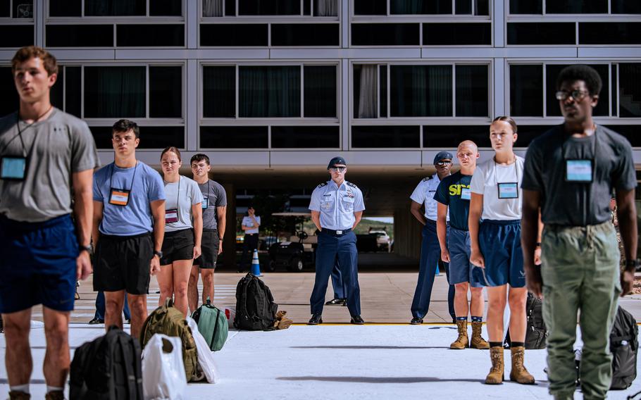Air Force Academy cadets stand in formation.