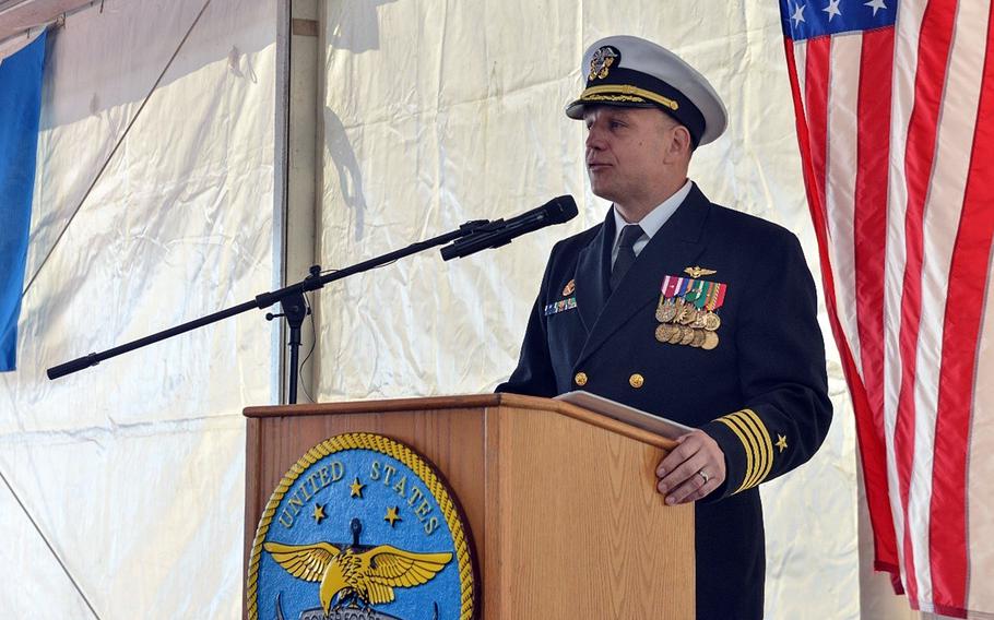 Capt. Daniel Prochazka, the outgoing commander of the USS Mount Whitney, speaks at a change of command ceremony in Gaeta, Italy, on April 11, 2023.  
