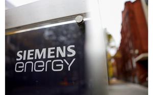 A Siemens Energy AG logo on a sign at the company's gas turbine factory in Berlin, Germany, on Friday, Oct. 27, 2023. MUST CREDIT: Liesa Johannssen-Koppitz/Bloomberg