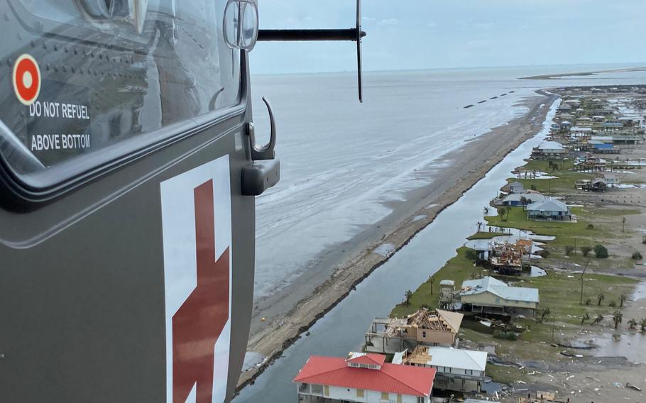 The crew of a UH-72 Lakota helicopter assigned to the Louisiana National Guard’s 2nd Batalltion, 151st Aviation Regiment fly throughout southeast Louisiana near Grand Isle to look for people in need of rescue following Hurricane Ida, which made landfall Aug. 29. They rescued two people stranded near Lafitte. 