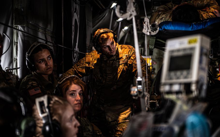 Senior Airman Zachary Vedder, an aerospace medical technician with the 86th Aeromedical Evacuation Squadron, listens to a briefing aboard a C-130 Hercules on June 6, 2023, during Exercise Saber Guardian 23. Members of the squadron trained Army and Air Force medical technicians and their Polish counterparts during a simulated air evacuation.